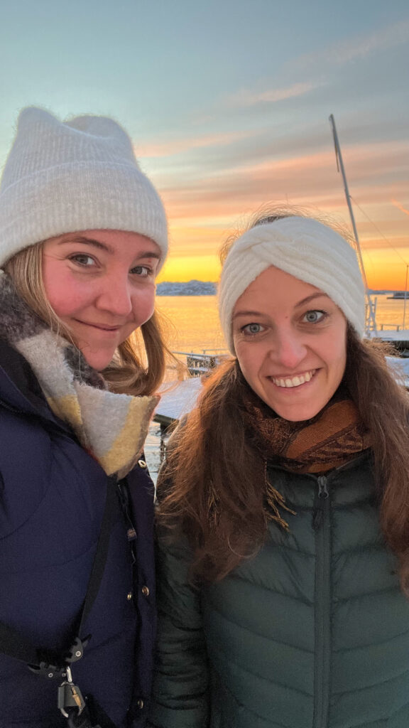 two smiling ladies in winter gear