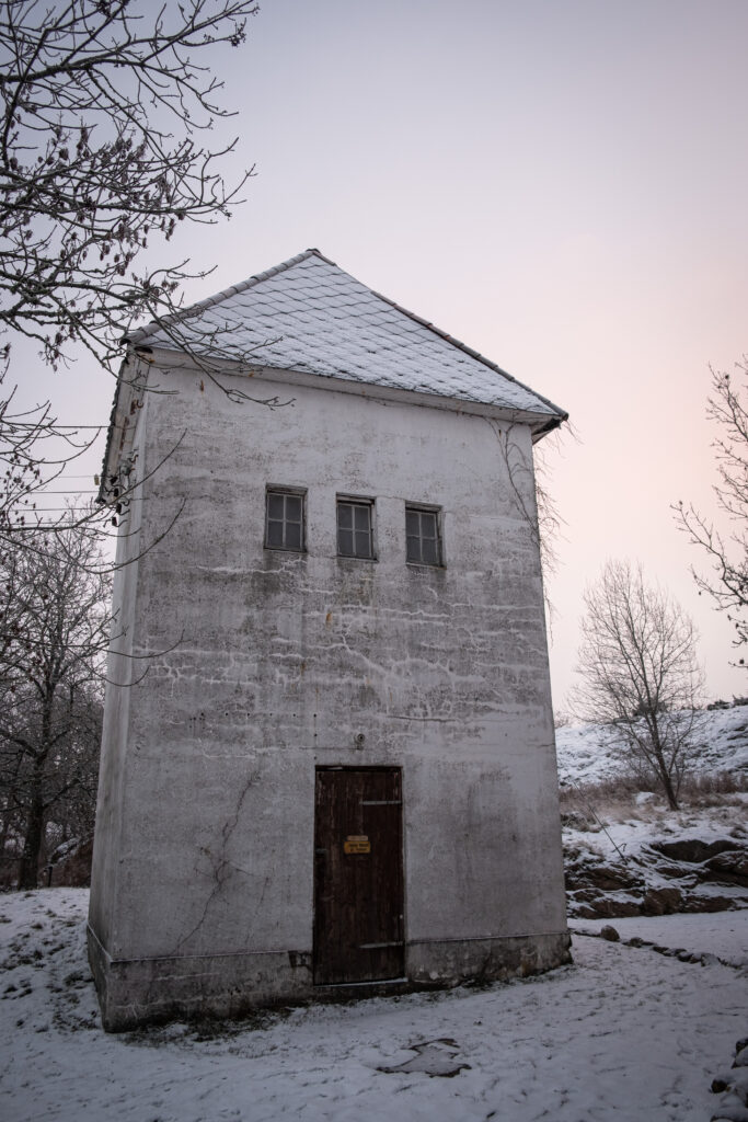 an old, white brick building